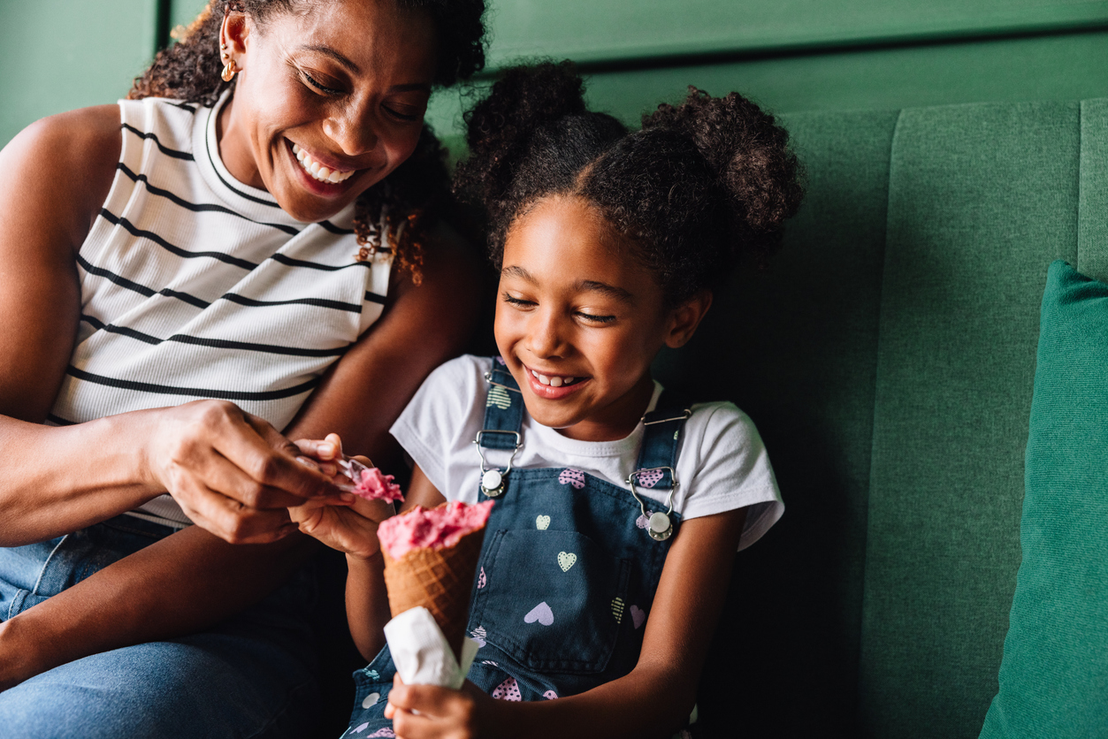 Family enjoying ice cream during a summer visit